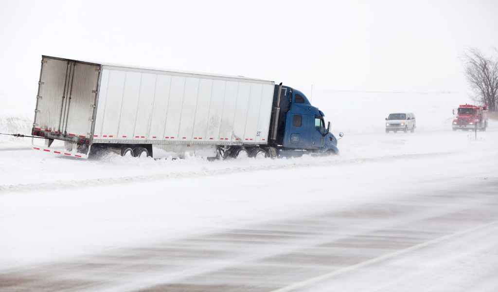 Bad Weather and road conditions cause truckloads to shift and require Pallet Restacking before delivery at destination
