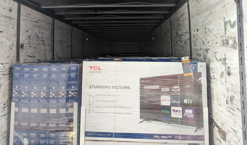 Finished restacking a truckload of electronics that tipped over before delivery - Pallets restacked for delivery with heavy duty corners
